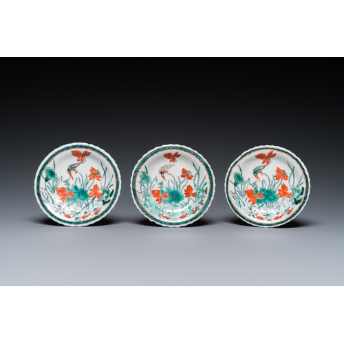 77 - Three Chinese Kangxi-style cafe-au-lait-ground famille verte cups and saucers, rabbit mark, 19th C.D... 