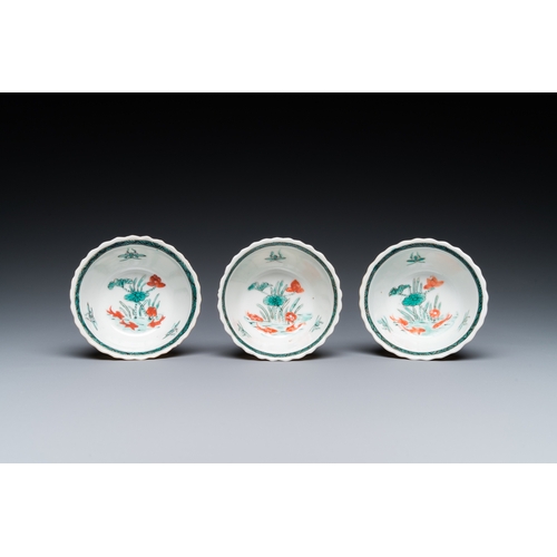 77 - Three Chinese Kangxi-style cafe-au-lait-ground famille verte cups and saucers, rabbit mark, 19th C.D... 