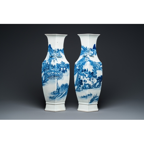 100 - A pair of Chinese blue and white hexagonal 'mountainous landscape' vases, 19th C.H.: 61 cm... 