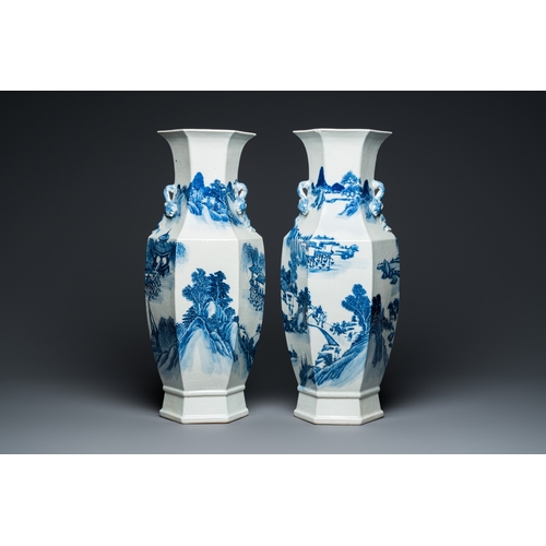 100 - A pair of Chinese blue and white hexagonal 'mountainous landscape' vases, 19th C.H.: 61 cm... 