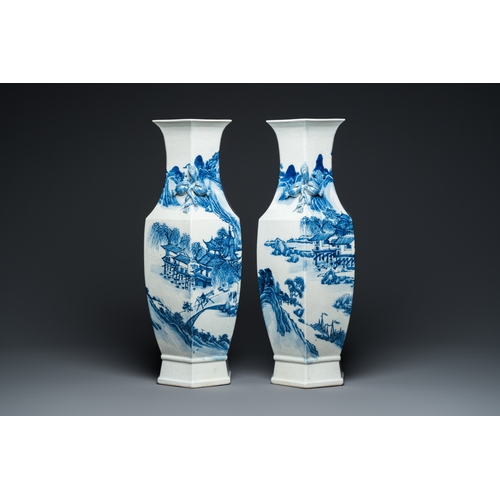 100 - A pair of Chinese blue and white hexagonal 'mountainous landscape' vases, 19th C.H.: 61 cm... 