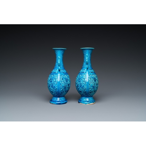 114 - A pair of Chinese turquoise-glazed 'lotus' vases, RepublicH.: 21,5 cm
 
 Condition: (UV-checked)- Th... 