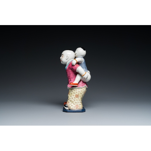 127 - A Chinese famille rose 'two boys' group, Zhu Mao Ji Zao æ±èè¨é  mark, RepublicH.: 25 cm... 