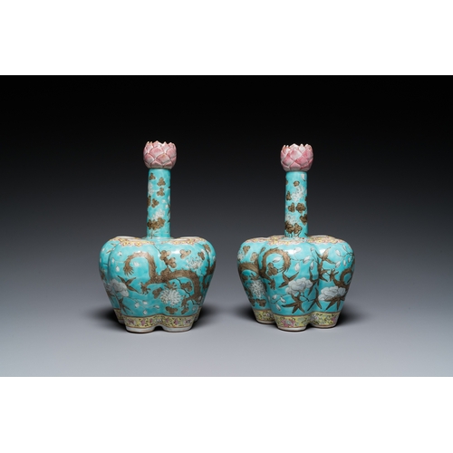 132 - A pair of Chinese famille rose turquoise-ground flower vases with dragons, 19th C.H.: 28 cm... 