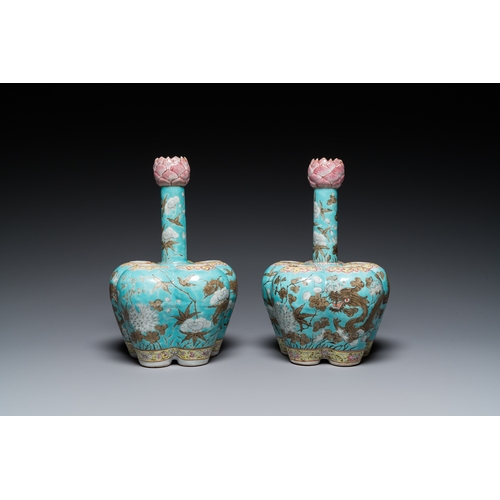 132 - A pair of Chinese famille rose turquoise-ground flower vases with dragons, 19th C.H.: 28 cm... 