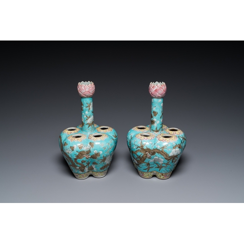 132 - A pair of Chinese famille rose turquoise-ground flower vases with dragons, 19th C.H.: 28 cm... 