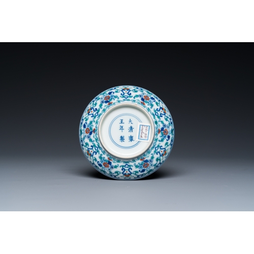 144 - A Chinese doucai saucer with floral design, Yongzheng mark, 19/20th C.Dia.: 11 cm