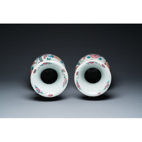 148 - A pair of Chinese famille rose 'phoenixes and pheasants' vases, 19th C.H.: 61,5 cm