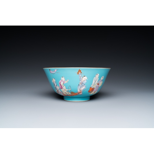 163 - A Chinese famille rose bowl with playing boys on a turquoise ground, Qianlong mark, 20th C.Dia.: 20 ... 