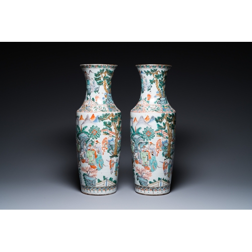 177 - A pair of Chinese Canton famille verte vases with garden scenes, 19th C.H.: 63 cm