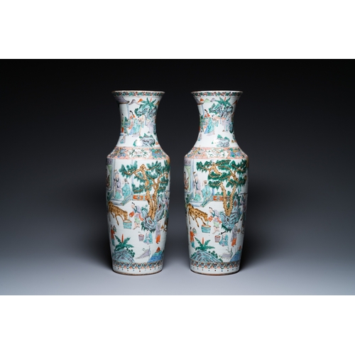 177 - A pair of Chinese Canton famille verte vases with garden scenes, 19th C.H.: 63 cm