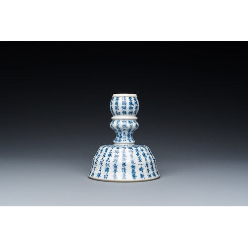 182 - A Chinese blue and white inscribed candlestick, Jin Yu Zhu Ji éçç è¨ mark, 19th C.H.: 12 cm... 