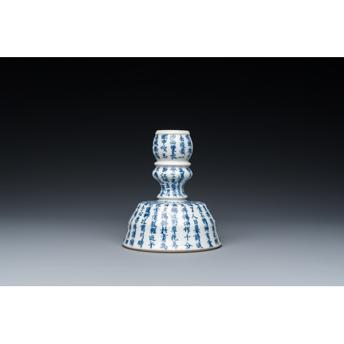 182 - A Chinese blue and white inscribed candlestick, Jin Yu Zhu Ji éçç è¨ mark, 19th C.H.: 12 cm... 