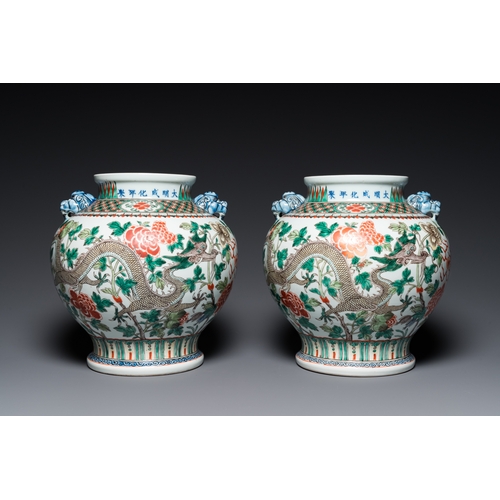 184 - A pair of Chinese famille verte 'dragon' vases, Chenghua mark, 19th C.H.: 37 cm (incl. the stands an... 