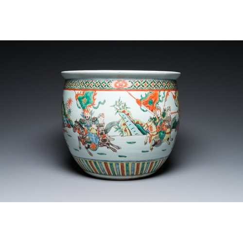 186 - A Chinese famille verte fish bowl with warriors on horseback, 19th C.Dia.: 36 cm - H.: 30,5 cm... 