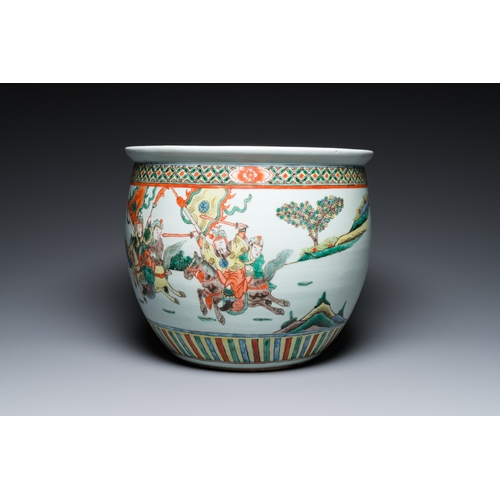 186 - A Chinese famille verte fish bowl with warriors on horseback, 19th C.Dia.: 36 cm - H.: 30,5 cm... 