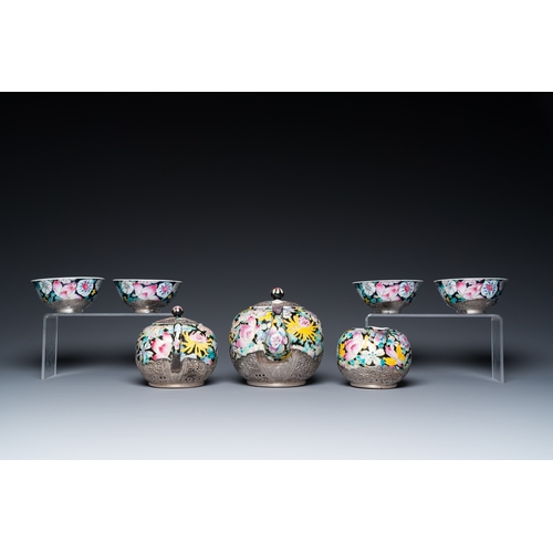 196 - A Chinese eight-piece silver-mounted famille rose millefleurs tea service, Qianlong mark 20th C.H.: ... 