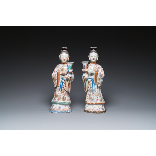 214 - A pair of large Chinese famille rose candle holders in the shape of Mandarin court ladies, QianlongH... 