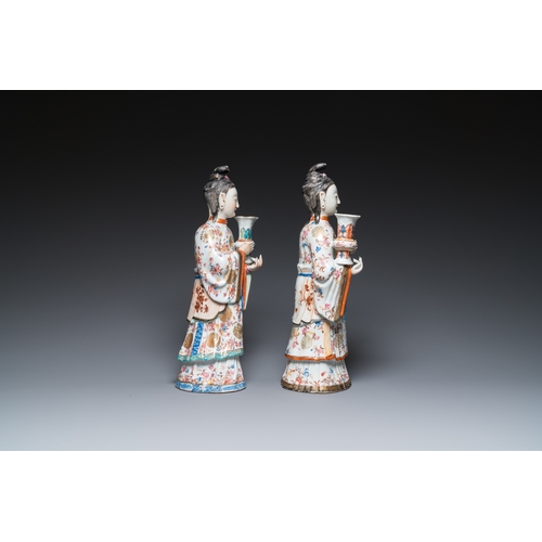 214 - A pair of large Chinese famille rose candle holders in the shape of Mandarin court ladies, QianlongH... 