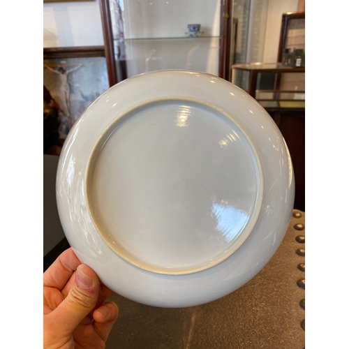 220 - A fine Chinese famille rose eggshell porcelain plate with a boy and two governesses in an interior, ... 