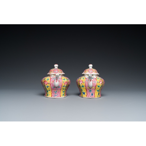 230 - A pair of Chinese octagonal famille rose teapots on stands, YongzhengL.: 14,5 cm (the stands)L.: 15 ... 