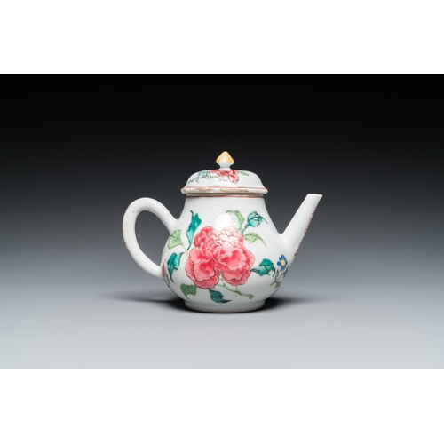 237 - A Chinese famille rose 'peony' teapot and cover, YongzhengL.: 15 cm - H.: 11 cm