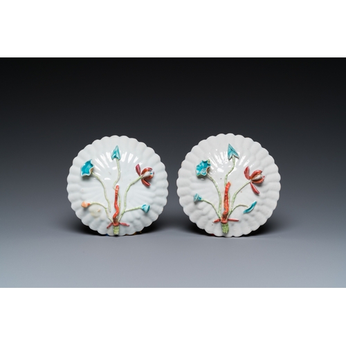 259 - A pair of Chinese famille rose relief-decorated cups and saucers, YongzhengDia.: 11 cm (the saucers)... 