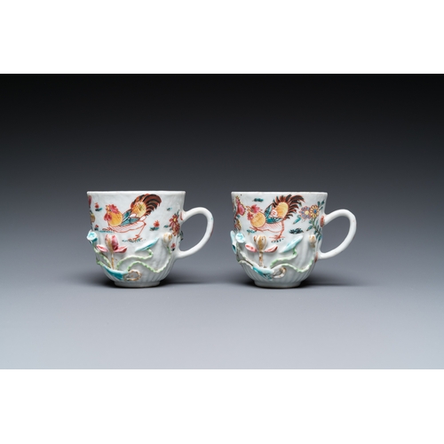 259 - A pair of Chinese famille rose relief-decorated cups and saucers, YongzhengDia.: 11 cm (the saucers)... 