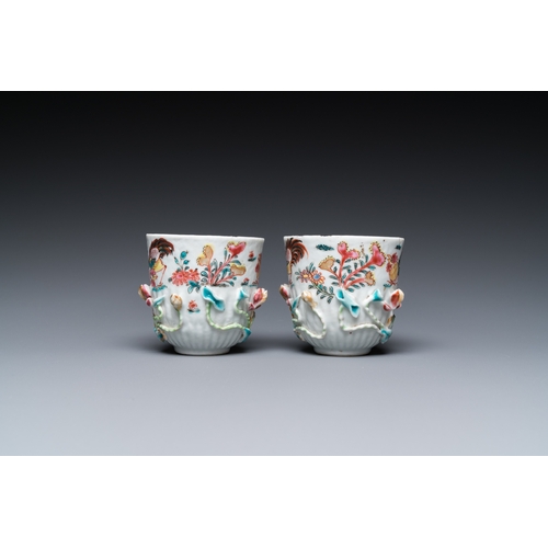 259 - A pair of Chinese famille rose relief-decorated cups and saucers, YongzhengDia.: 11 cm (the saucers)... 