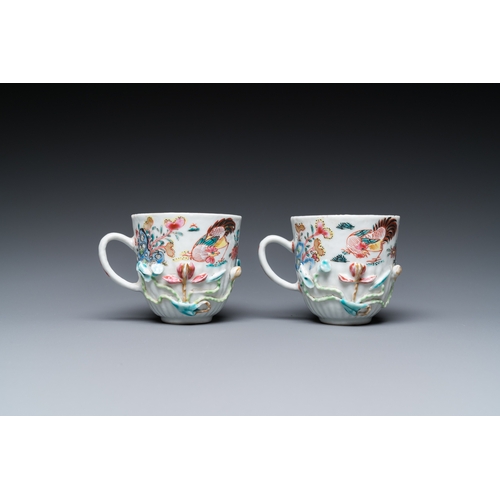 259 - A pair of Chinese famille rose relief-decorated cups and saucers, YongzhengDia.: 11 cm (the saucers)... 