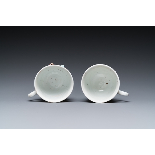 259 - A pair of Chinese famille rose relief-decorated cups and saucers, YongzhengDia.: 11 cm (the saucers)... 