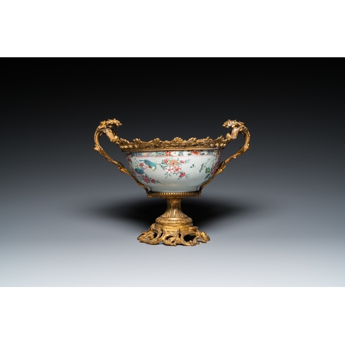 266 - A Chinese gilt bronze-mounted famille rose bowl, YongzhengL.: 36 cm - H.: 27,5 cm (the total size)... 