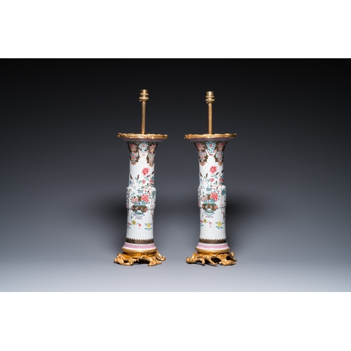 272 - A pair of Chinese famille rose vases with fine gilt bronze lamp mounts, YongzhengH.: 58 cm (incl. th... 