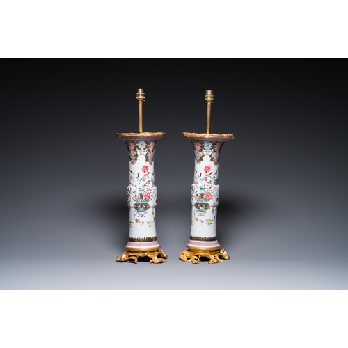 272 - A pair of Chinese famille rose vases with fine gilt bronze lamp mounts, YongzhengH.: 58 cm (incl. th... 