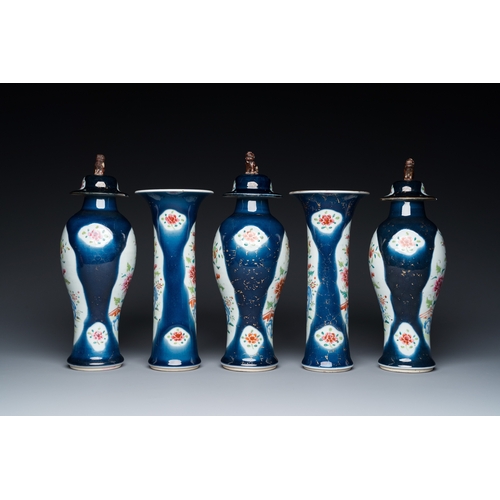 274 - A Chinese blue-ground famille rose garniture of five vases with floral design, QianlongH.: 28,5 cm (... 