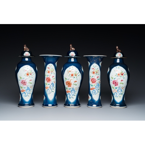 274 - A Chinese blue-ground famille rose garniture of five vases with floral design, QianlongH.: 28,5 cm (... 