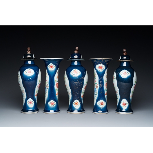 274 - A Chinese blue-ground famille rose garniture of five vases with floral design, QianlongH.: 28,5 cm (... 