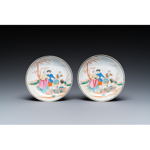 292 - A pair of Chinese famille rose 'European subject' cups and saucers, QianlongDia.: 12 cm (the saucers... 