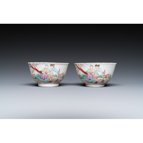 292 - A pair of Chinese famille rose 'European subject' cups and saucers, QianlongDia.: 12 cm (the saucers... 