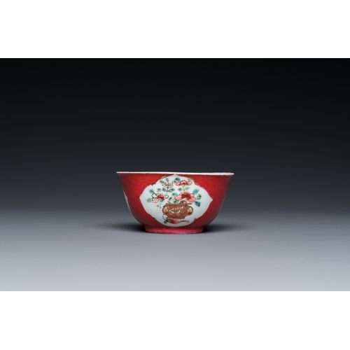 308 - A Chinese famille rose ruby-ground cup and saucer, YongzhengDia.: 11,5 cm (the saucer)Dia.: 7 cm - H... 