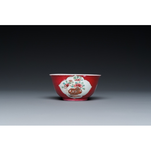 308 - A Chinese famille rose ruby-ground cup and saucer, YongzhengDia.: 11,5 cm (the saucer)Dia.: 7 cm - H... 