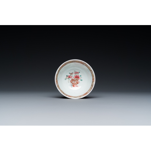 308 - A Chinese famille rose ruby-ground cup and saucer, YongzhengDia.: 11,5 cm (the saucer)Dia.: 7 cm - H... 