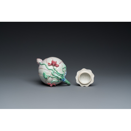 314 - A Chinese famille rose 'lotus' teapot and cover, YongzhengL.: 15 cm - H.: 13 cm
 
 Condition: (UV-ch... 