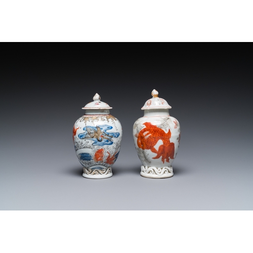 361 - Two Chinese blue, white and iron-red 'carps' tea caddies, YongzhengH.: 13 cm (the tallest)... 