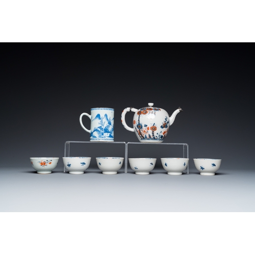 365 - Six Chinese famille rose cups and saucers, an Imari-style teapot and a blue and white mug, Kangxi/Qi... 