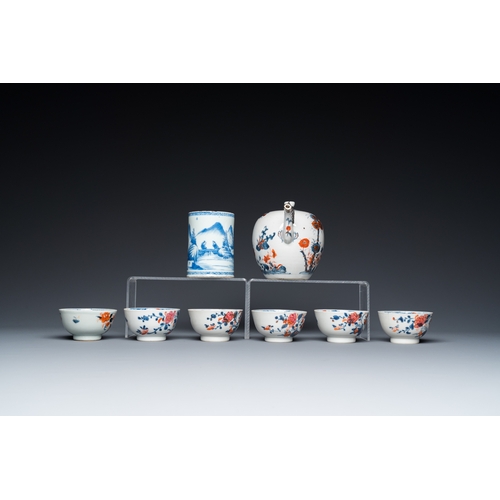 365 - Six Chinese famille rose cups and saucers, an Imari-style teapot and a blue and white mug, Kangxi/Qi... 