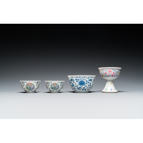 377 - A Chinese famille rose stem cup, a blue and white bowl and a pair of doucai bowls, Yongzheng and lat... 