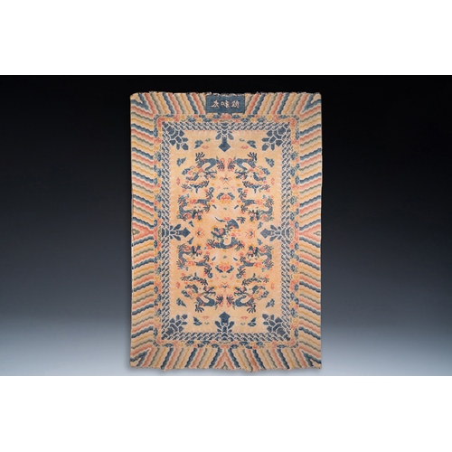 436 - A large Chinese Ningxia rug with dragons on a yellow ground, Tai He Tian å¤ªåæ®¿ mark, 19th C.Dim.... 