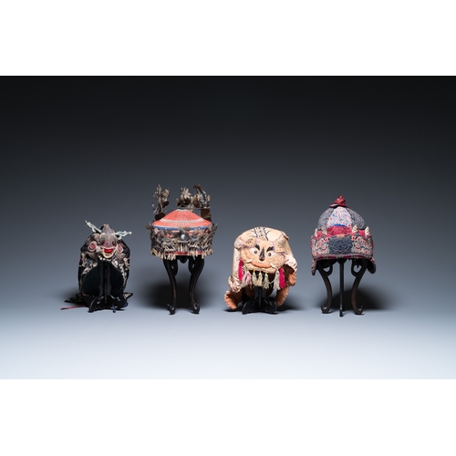 444 - Eight Chinese children's hats, 19/20th C.Dim.: 28 x 23 x 21 cm (the red hat)