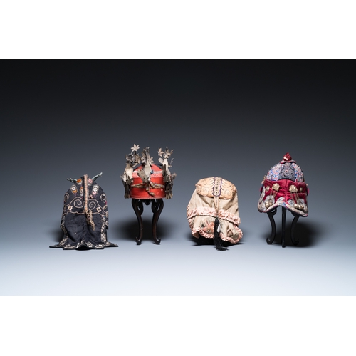 444 - Eight Chinese children's hats, 19/20th C.Dim.: 28 x 23 x 21 cm (the red hat)